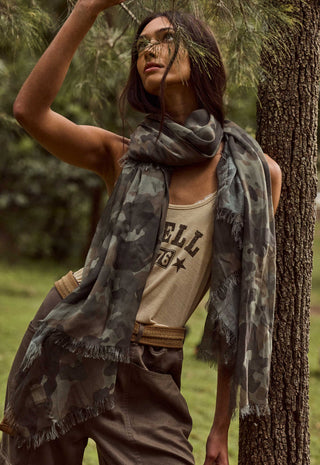  paired with a beige tank top and brown cargo pants.