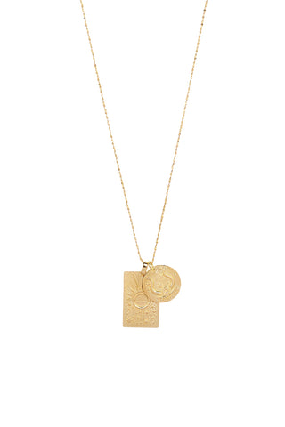 Front view of Spell’s Taurus Stargazer Zodiac Necklace. The double embossed pendant charm necklace comes in 22k Gold Vermeil and hangs from a twisted rope chain.